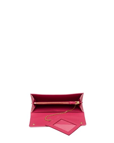 prada pink wallet bow|Petal Pink/peony Pink Large Saffiano leather wallet with bow .